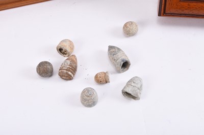 Lot 96 - CRIMEAN WAR - Two Russian medals, with buttons and bullets recovered from Sevastopol