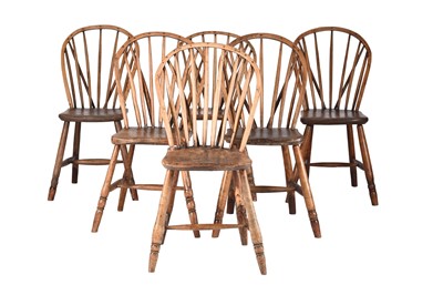 Lot 65 - A set of six yew and elm Windsor type dining chairs