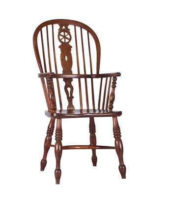 Lot 54 - An early-mid 19th century ash and elm Windsor armchair