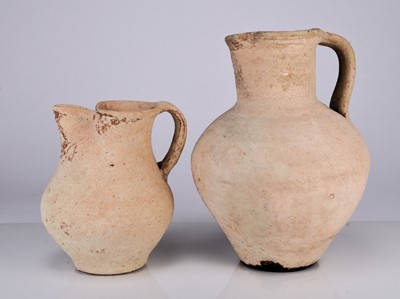 Lot 34 - Two Roman earthenware pitchers, circa 2nd century AD