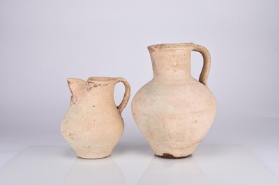 Lot 34 - Two Roman earthenware pitchers, circa 2nd century AD