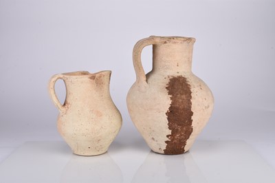 Lot 34 - Two Roman earthenware pitchers, circa 2nd century AD