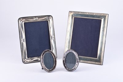 Lot 52 - Four silver mounted frames