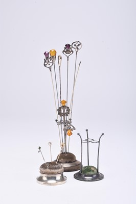 Lot 30 - A collection of pin stands and pins