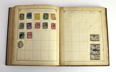 Lot 388 - An old Lincoln album moderately filled. Noted: GB 1d Black