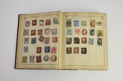 Lot 388 - An old Lincoln album moderately filled. Noted: GB 1d Black