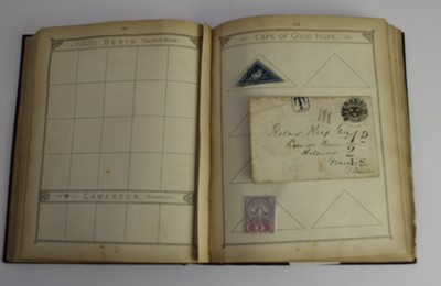 Lot 388 - An old Lincoln album moderately filled. Noted: GB 1d Black