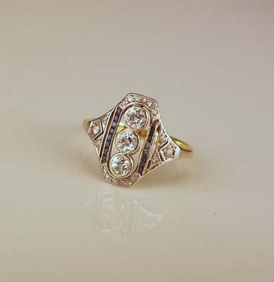 Lot 343 - An Art Deco diamond and sapphire ring