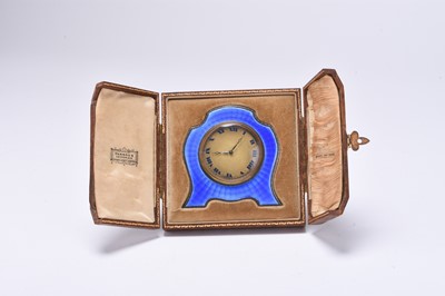 Lot 102 - A silver and guilloche enamelled clock retailed by Harrods