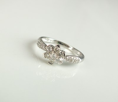 Lot 194 - An 18ct white gold diamond floral cluster ring