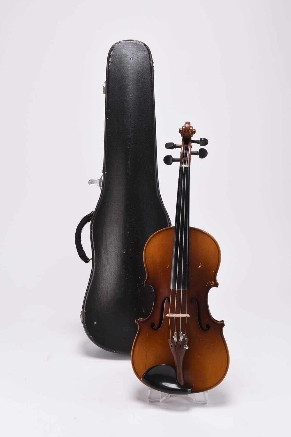 Lot 15 - A cased violin with music stand