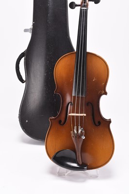 Lot 15 - A cased violin with music stand