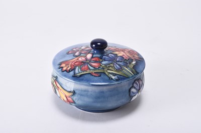 Lot 64 - William Moorcroft 'Spring Flowers' powder bowl and cover, mid-20th century