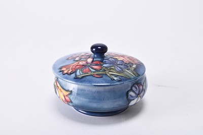 Lot 64 - William Moorcroft 'Spring Flowers' powder bowl and cover, mid-20th century
