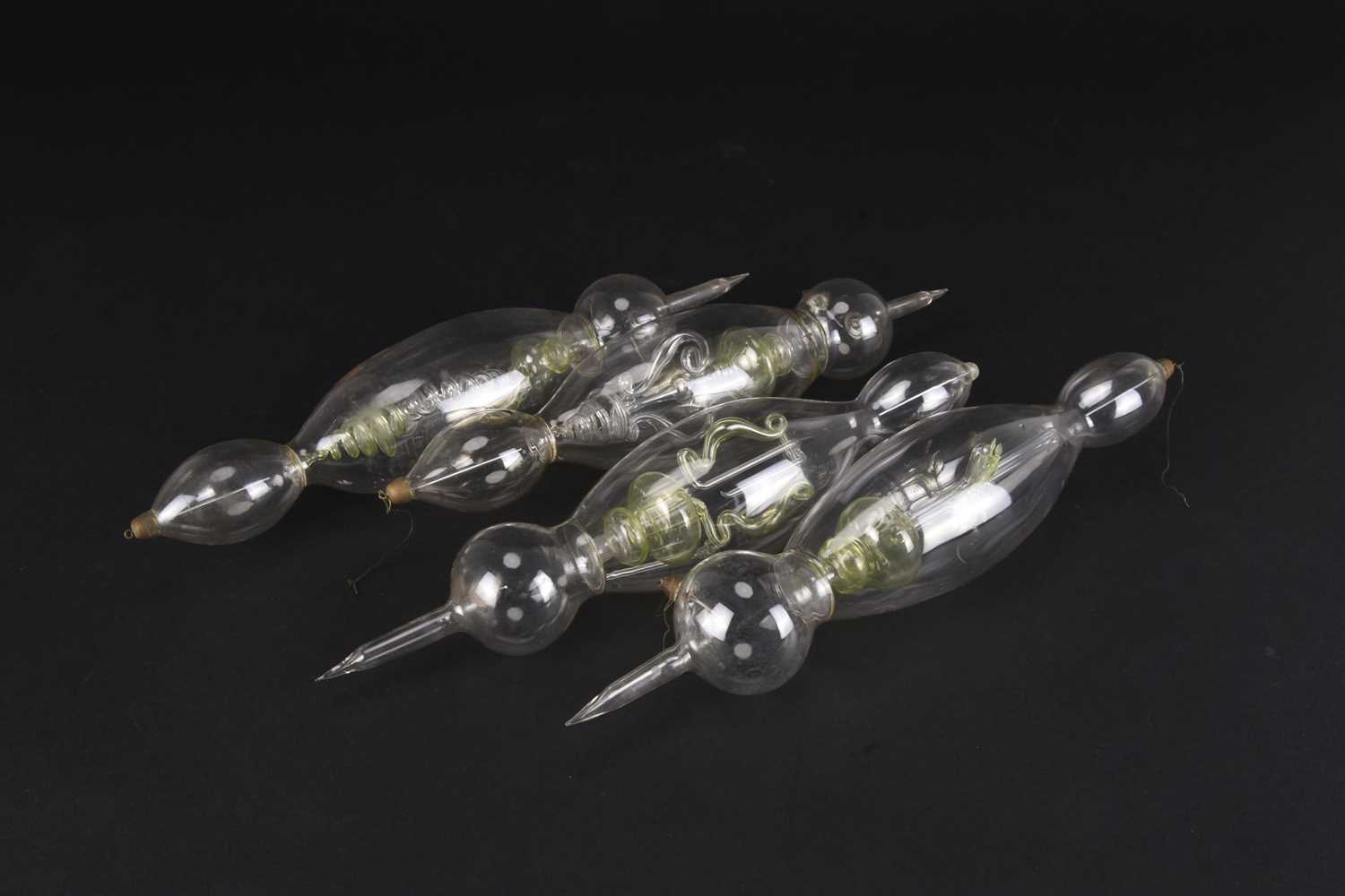 Lot 58 - A set of five Geissler glass discharge tubes
