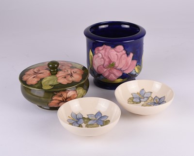 Lot 70 - Moorcroft including a Hibiscus powder jar and a Magnolia planter