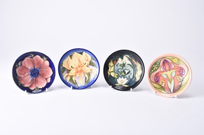 Lot 73 - Four Moorcroft pin dishes or coasters, 20th/21st century