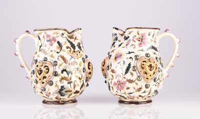 Lot 106 - A pair of Zsolnay Pecs jugs, circa 1882-5