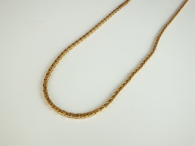 Lot 142 - A yellow metal entwined link necklace chain