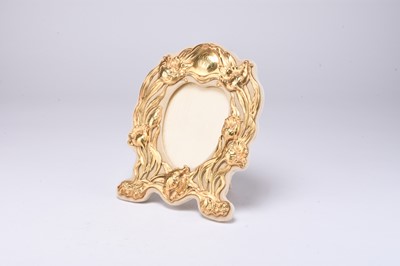 Lot 80 - An Art Nouveau Sterling gilt mounted photograph frame