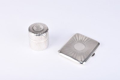 Lot 25 - A silver cigarette case and a silver travelling ink pot