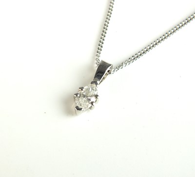 Lot 212 - An 18ct white gold marquise diamond pendant on chain