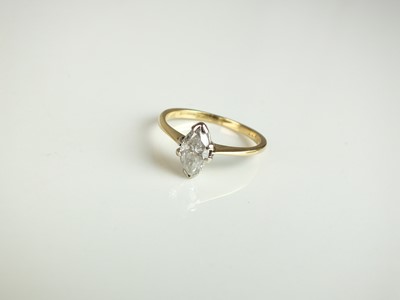 Lot 312 - An 18ct gold single stone marquise diamond ring