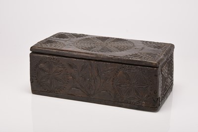 Lot 57 - A carved oak coffret or missel box, circa 1500