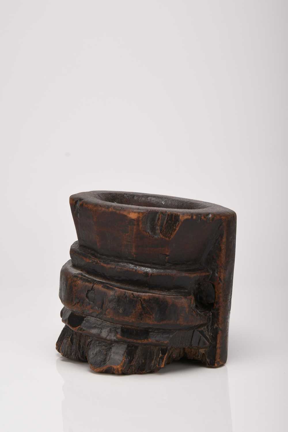 Lot 46 - A carved yew wood mortar, probably Spanish