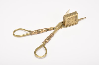 Lot 54 - A brass candle snuffer wick trim, Nuremberg, 17th century