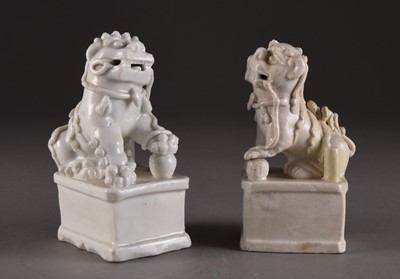 Lot 146 - A group of four Chinese figures of lion dogs