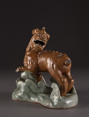 Lot 146 - A group of four Chinese figures of lion dogs
