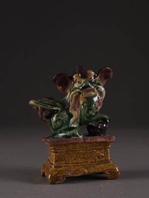 Lot 146 - A group of four Chinese figures of lion dogs