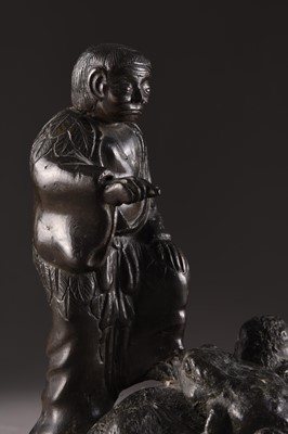 Lot 203 - A Japanese bronze figure of an oni with a toad, Meiji era