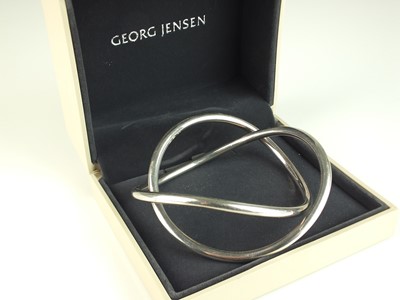 Lot 307 - A George Jensen silver ‘Swing’ bracelet/bangle