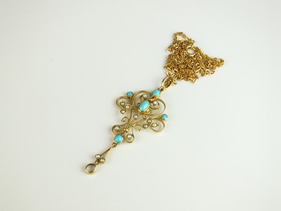 Lot 215 - An early 20th century turquoise and split seed pearl pendant on chain