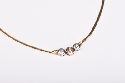 Lot 347 - A 9ct yellow and white gold diamond set necklace