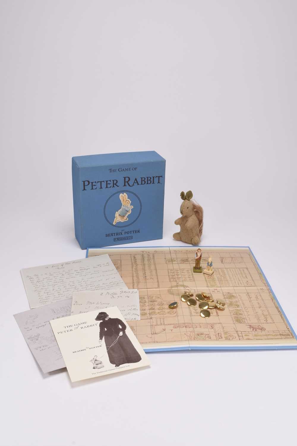 Lot 9 - A group of toys and figures, with some Beatrix Potter interest