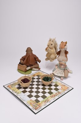 Lot 9 - A group of toys and figures, with some Beatrix Potter interest