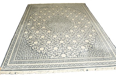 Lot 383 - A blue and white rug