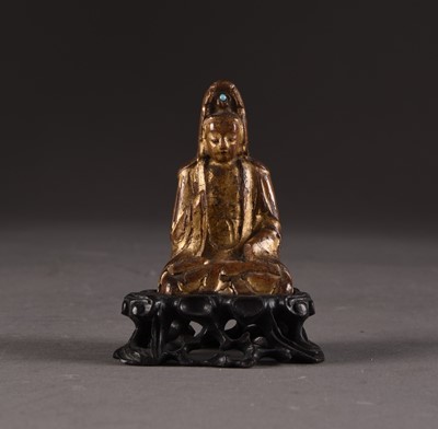 Lot 171 - A Chinese carved and gilt wood figure of Guanyin, late Ming/early Qing Dynasty
