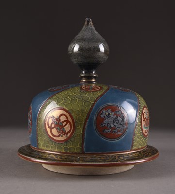 Lot 353 - A Chinese clobbered vase cover, Qing Dynasty