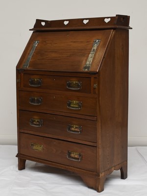 Lot 117 - An Art Nouveau style oak bureau desk