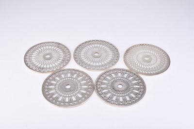 Lot 50 - A collection of five silver mounted glass coasters