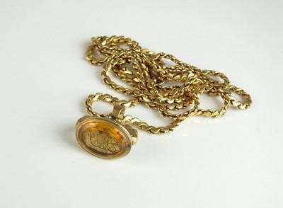 Lot 216 - A yellow metal scroll link chain necklace with fob