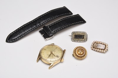 Lot 353 - Three brooches and a watch