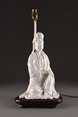 Lot 105 - A Chinese blanc de chine figure of Guanyin, mounted as a table lamp