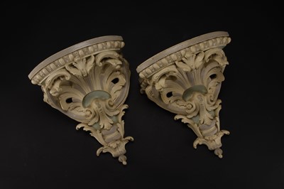 Lot 32 - A pair of neoclassical carved wood and gesso wall brackets