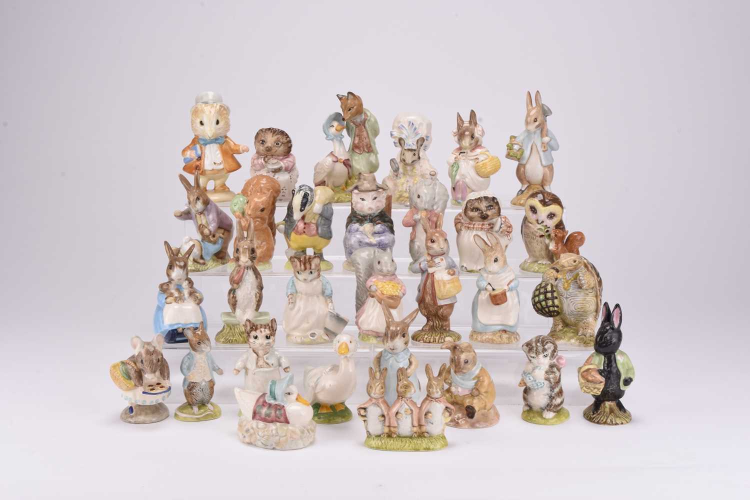 Lot 7 - A collection of thirty Beatrix Potter figures, primarily Royal Albert