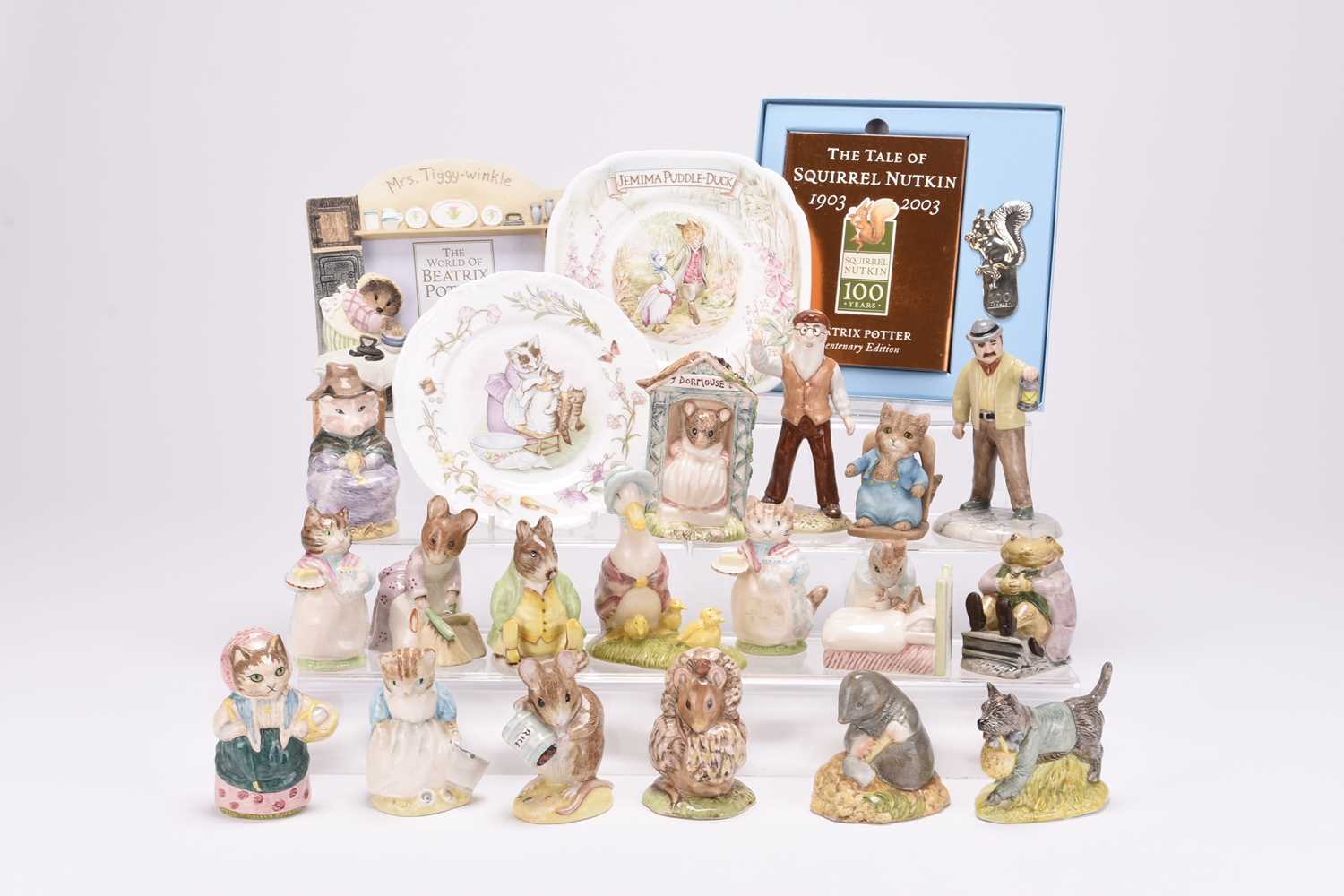 Lot 5 - A group of Beswick and Royal Albert Beatrix Potter figures, with book and bookplate and other items